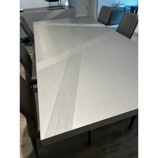Roche Bobois Trak Dining Table With BuiltIn Extension Chairish