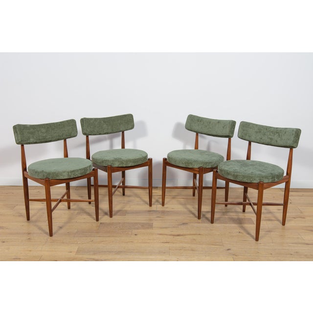 This set of four dining chairs was produced by G-Plan in the United Kingdom circa 1960. It was designed by I. Kofod-...