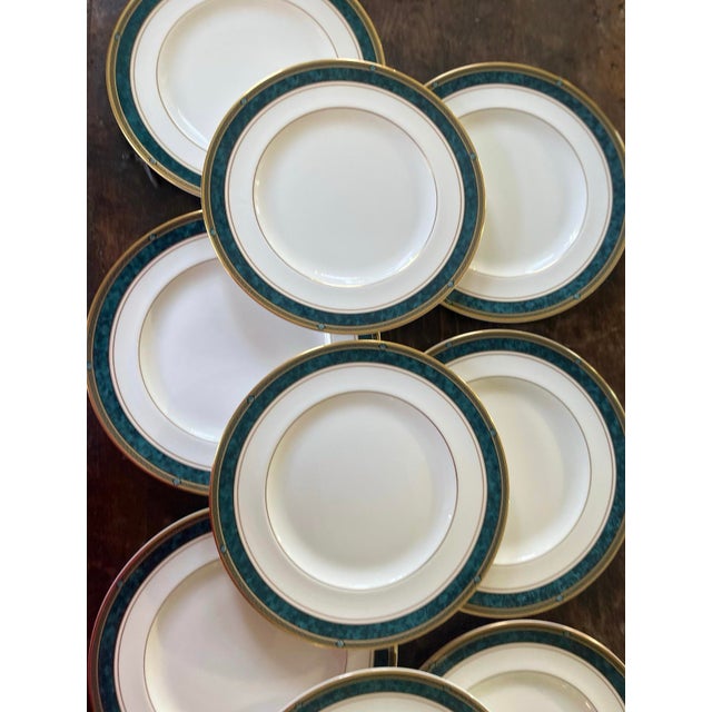 Fabulous set of Royal Doulton plates, presented in the Biltmore pattern. Crisp white, fine bone China with an emerald...