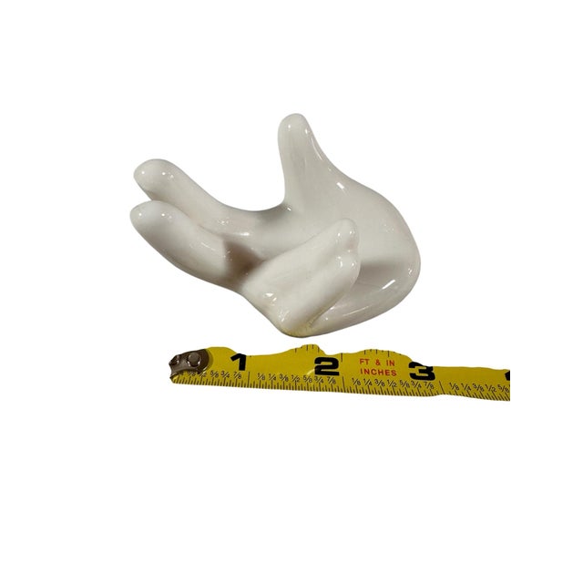 Little white ceramic hand, perfect for business cards as a ring holder, whatever your heart desires