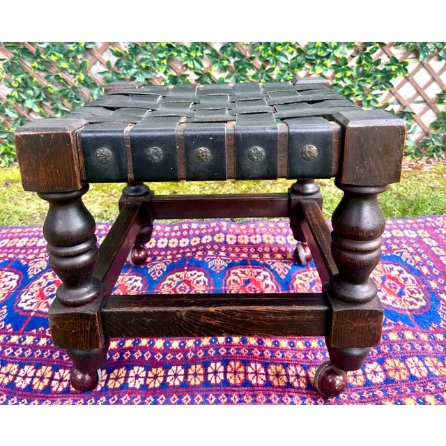 Vintage Spanish Revival Woven Leather Strap Rolling Footstool For Sale - Image 13 of 13