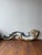 This 18th Century artifact is an exquisite wall sculpture featuring an ornate antique scroll motif. Crafted to evoke...