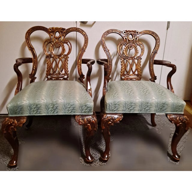 Pair of mahogany century armchair Chippendale revival. Striped upholstery with gooseneck arms carving 26 x 22 x 37