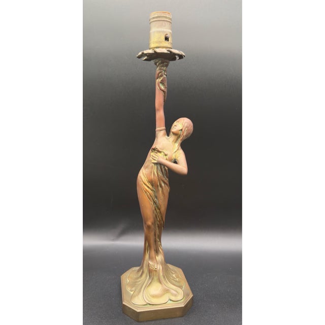 This gorgeous antique Art Nouveau table lamp features a beautifully designed figural base depicting a graceful young...