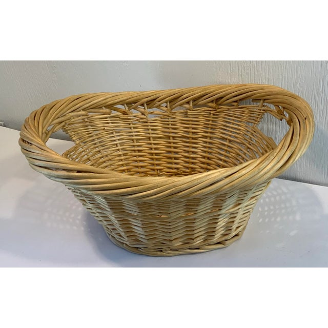 Nice vintage wicker basket. Lots of uses for this one!