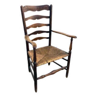 19th Century English Georgian Oak and Elm Rush Seat Ladderback Carver Armchair For Sale