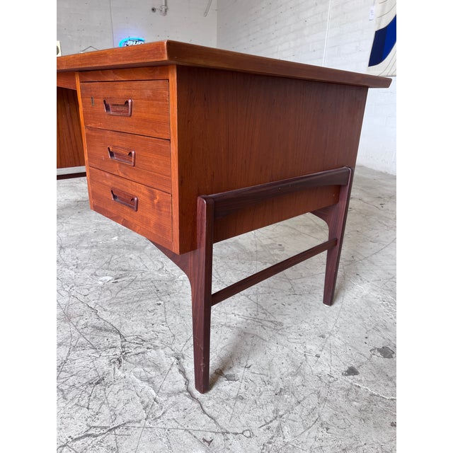 Newly refinished gorgeous Danish teak vintage desk, featuring 6 drawers that move freely, and a floating style bookcase on...
