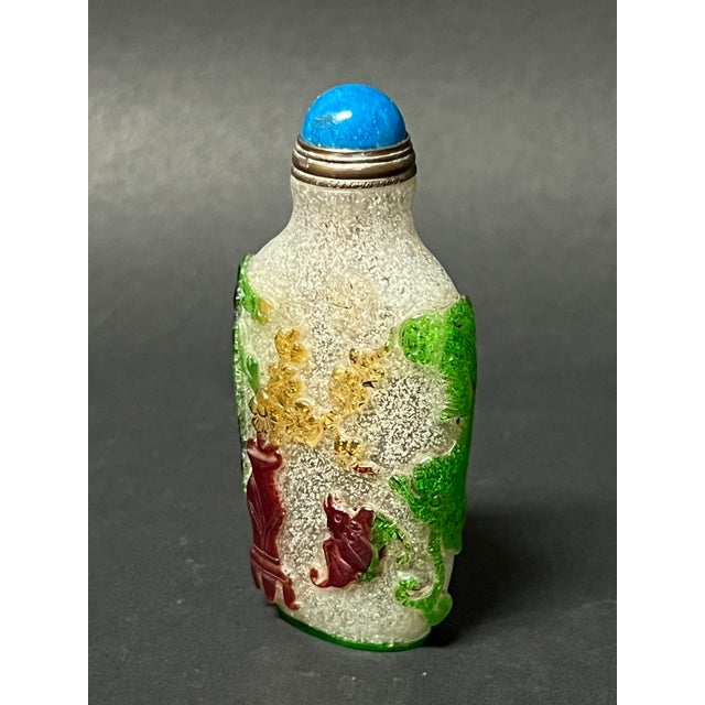 Chinese Art Peking Glass Overlay Snuff Bottle ITEM NAME: Chinese Art Peking Glass Overlay Snuff Bottle ORIGIN: China AGES:...