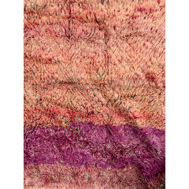 This rare vintage Beni M’Guild rug embodies the warmth and depth of Moroccan Middle Atlas craftsmanship. Handwoven...