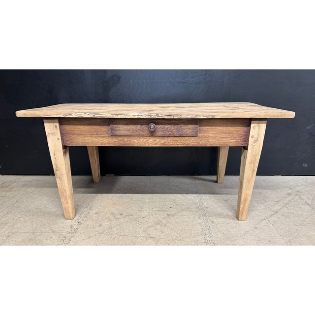 French Oak Normandy Coffee Table having single drawer to front. Lovely colour and patina. The drawer bottom is a bit worn...