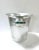 A classic vintage French champagne bucket crafted in brushed aluminum with traditional side handles and understated banded...