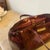This sophisticated Louis Vuitton Wilshire hand bag is meticulously crafted from the house's iconic Monogram Vernis patent...