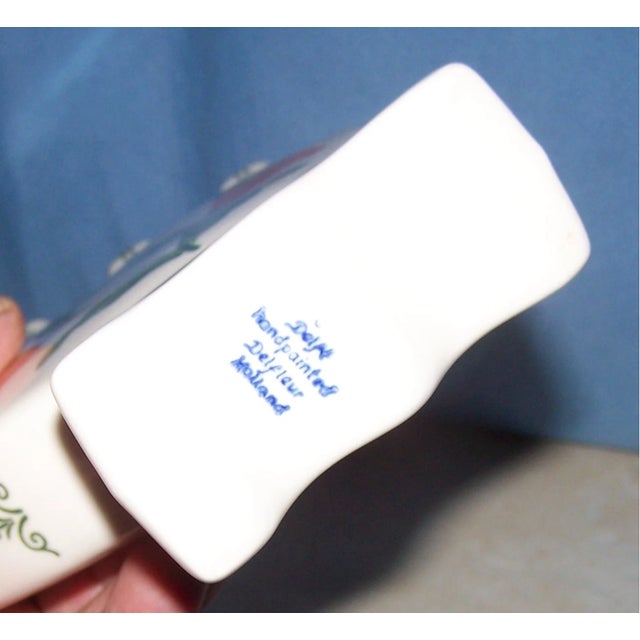 Elevate your home with this charming vintage Delft-inspired five-finger tulip vase in a rare and refreshing soft green...