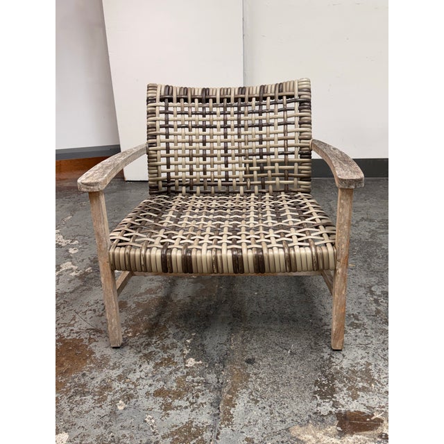 Design Plus Gallery presents the Isola Lounge Chair from Frontgate. The chair combines a weathered teak frame and an open...