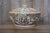 A substantial antique Chinese famille rose Canton porcelain covered bowl dating to the second half of the 19th century,...