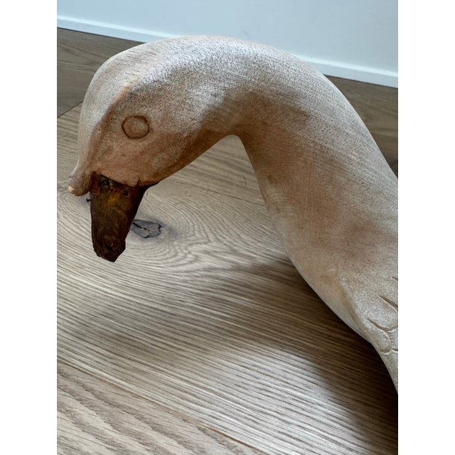 A striking vintage Arthur Court Designs carved wooden swan sculpture, dated 1990. Beautifully sculpted with an elongated,...