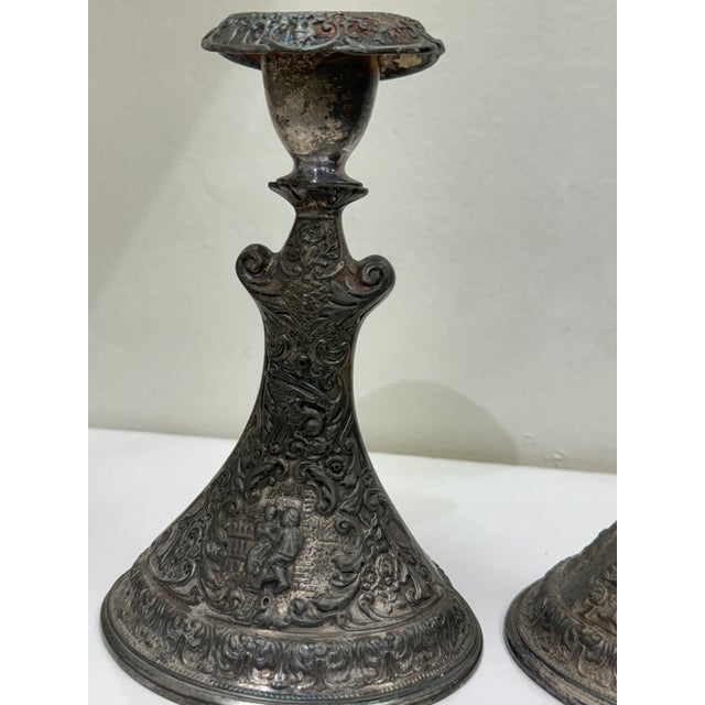 Elegant pair of Candle Holders from the historic Derby company. These items were made across the turn of the century in...