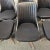 Set of 6 period perfect 1960s Chromcraft lounge chairs. This set wears its original black vinyl, with seats raised on cast...