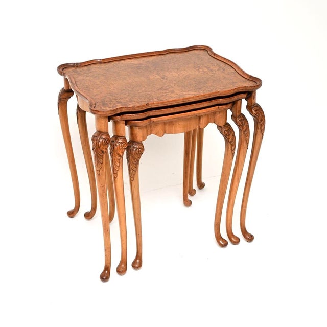 A beautiful antique burr walnut nest of tables in the Queen Anne style. They were made in England, and date from around...