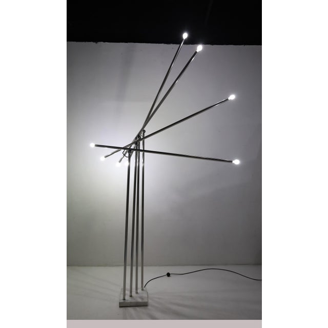This floor lamps commands attention. It stands 102"H and the arms can be adjusted in multiple configurations. Like a piece...