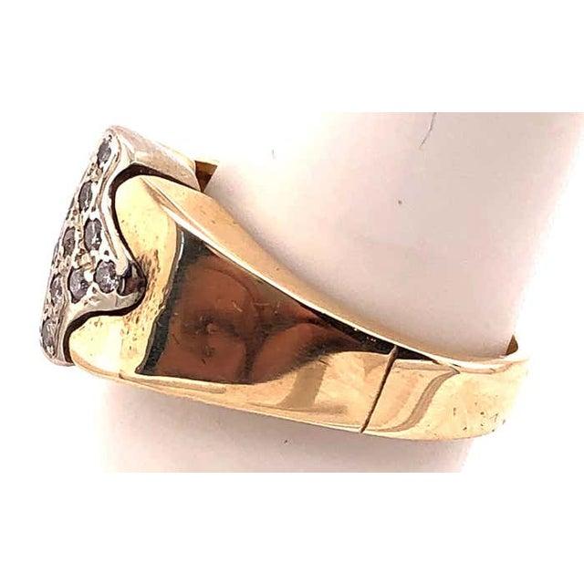 14 Karat Two Tone Yellow And White Gold Ring With Diamond Cluster 0.30 TDW. Size 7 7 grams total weight.