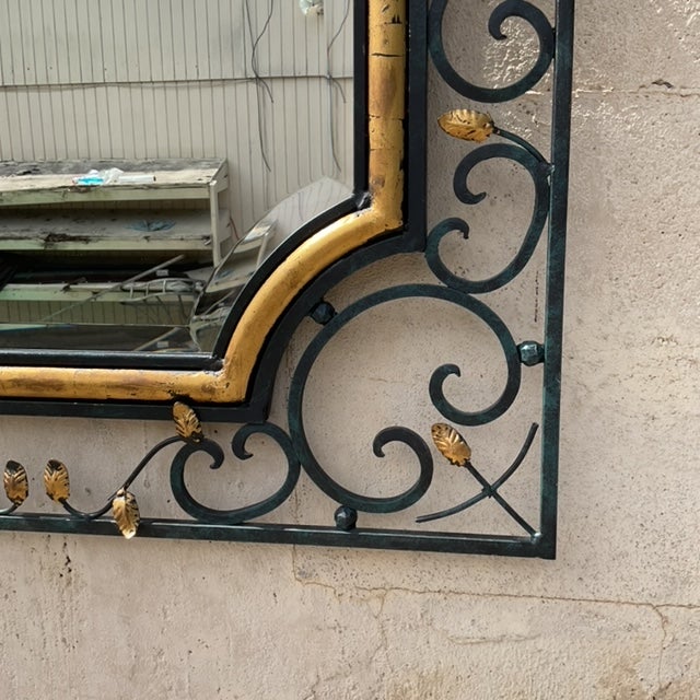 Elevate your space with this vintage Regency LaBarge mirror, featuring a striking iron frame with gilt accents. The ornate...