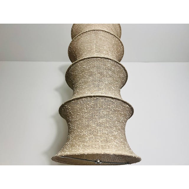 This vintage fabric ceiling lamp by Leola from the 1970s is a stunning example of Italian mid-century design. The lamp...