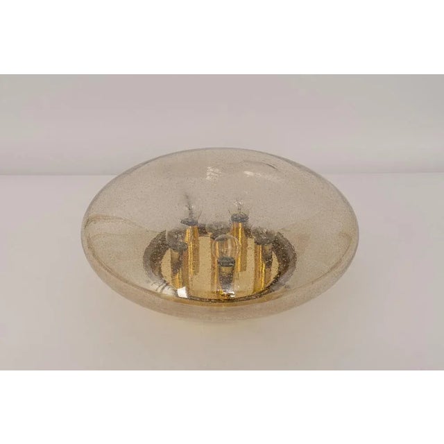 Large smoked glass flush mount manufactured by limburg glashütte germany, circa 1960-1969. Wonderful spaceship form and a...