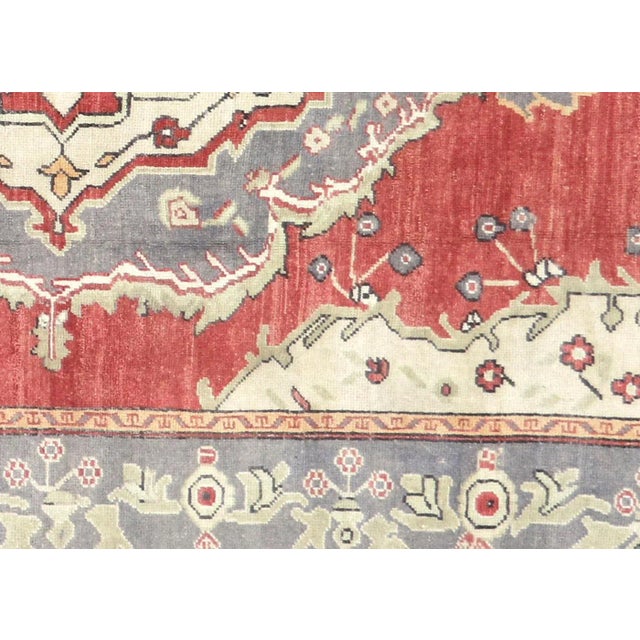 1960s Turkish Oushak Rug. Handwoven with wool on wool foundation in the Oushak region of Western Turkey. The Anatolian...