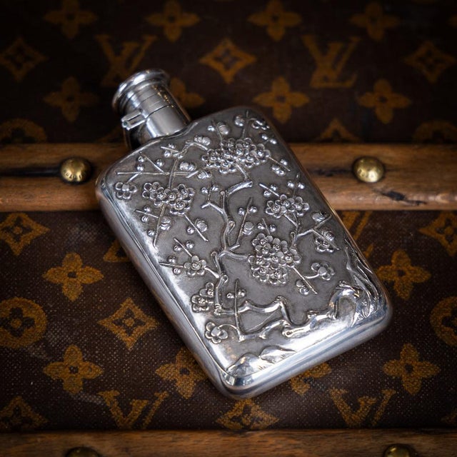 Antique 19th Century Japanese export solid silver hip flask. Of a rectangular shape with rounded corners and a curved...