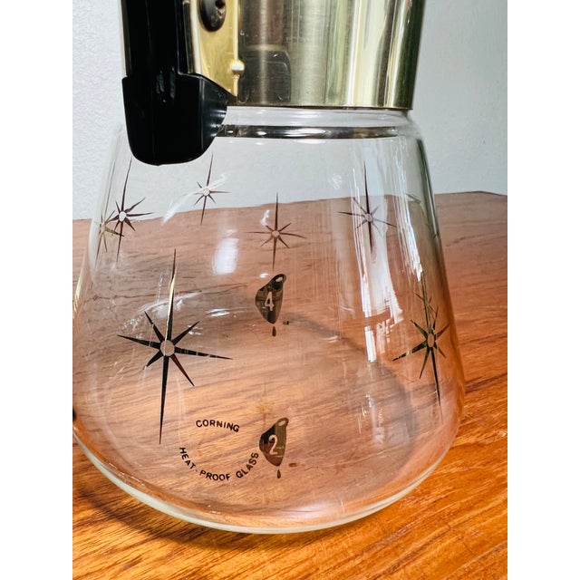 Vintage Corning Ware Starburst Coffee 4 Cup Carafe 1960s Era lovely nostalgic well sought after starburst pattern. Great...