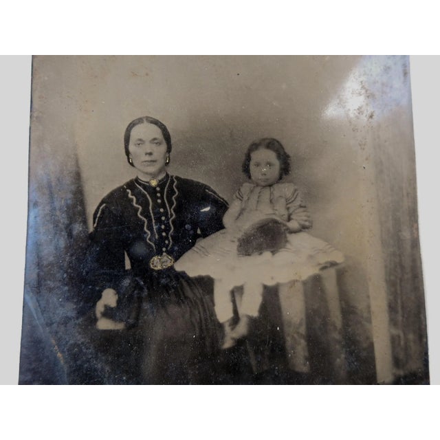 Antique circa 1860's full plate tintype photograph of handsome woman and little girl. Metallic gold painted jewelry,...