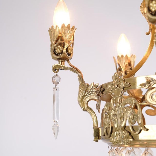 Antique Crystal Chandelier in Gilt Bronze with Louvre Style Decorations, 1920s For Sale - Image 3 of 14