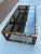 Asian influenced faux bamboo with brass clad accented base, having thick smoked glass inset top, made by Drexel Heritage,...
