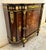 Introduce timeless French elegance into your home with this extraordinary Louis XVI-inspired sideboard cabinet,...
