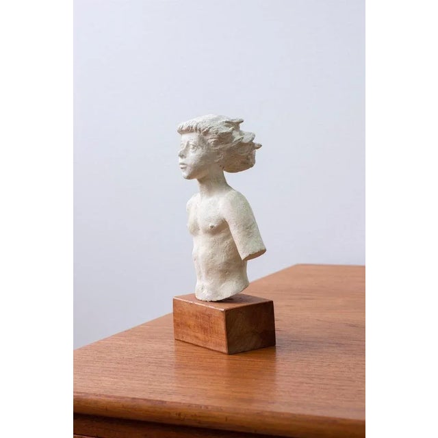 Sculpture depicting "Blanzeflor" by Swedish sculptor Stig Blomberg. Made ca 1942-43 in Sweden. Plaster on a teak base....