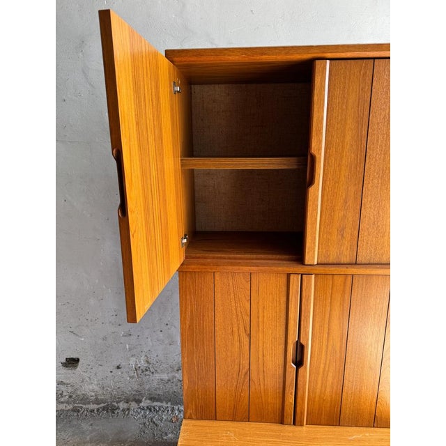 Tall danish teak cabinet with integrated handles – 1970s modular design a clean and elegant vintage teak cabinet , typical...