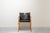Armchair made of light alder wood and black leather straps by Gianfranco Frattini for Bernini in the 1980s. The clean...