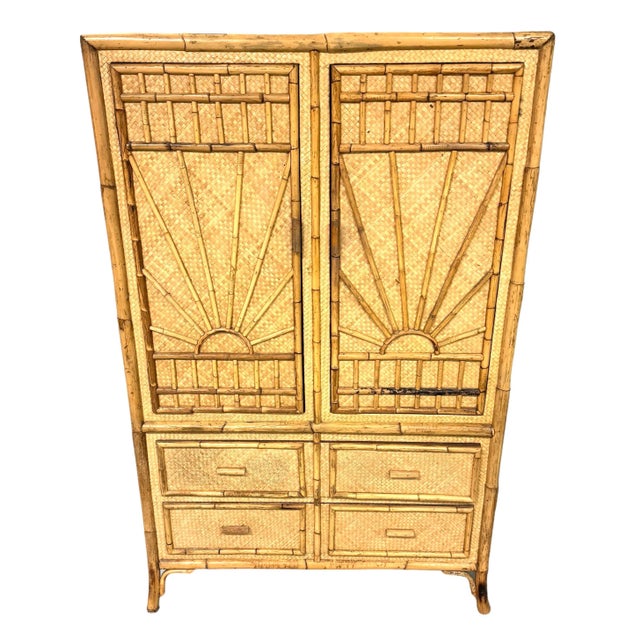 Rattan and bamboo armoire. covered in woven grasscloth and edged in bamboo. bamboo design on front and both sides. large...