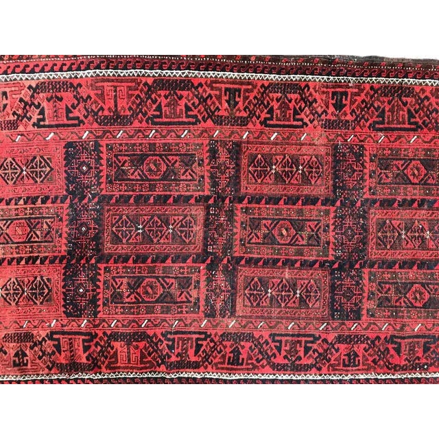 Beautiful late 19th century Baluch rug with nice natural colors with red, brown and blue, and tribal geometric design,...