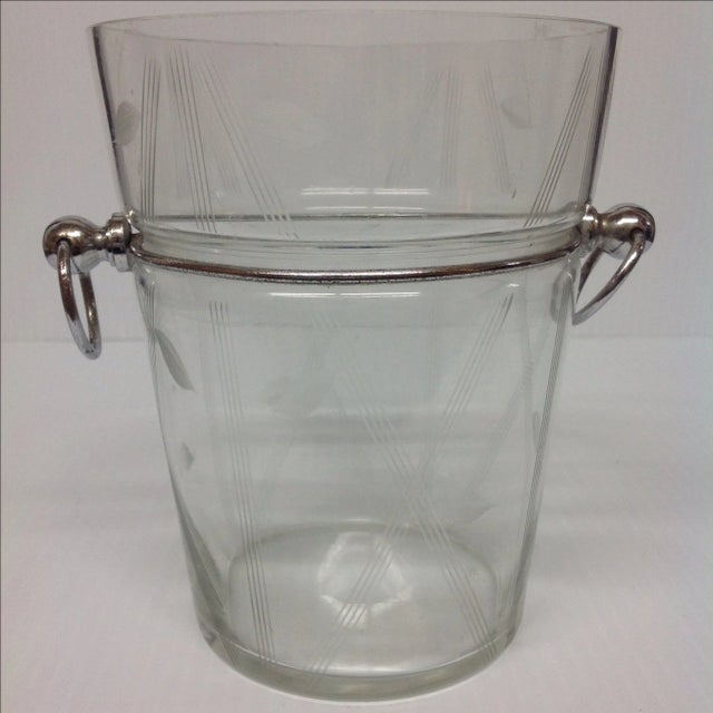 Mid-century cut glass ice bucket featuring a chrome band and classic, ring-style chrome handles. A note from the seller:...