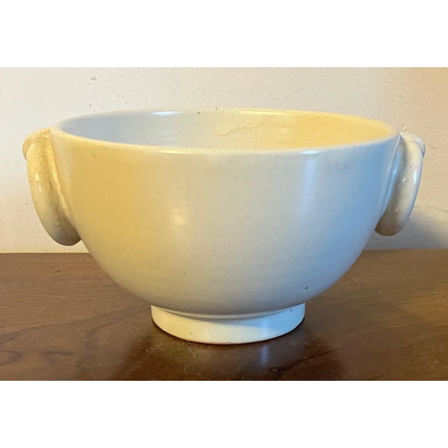 French Art Deco pottery bowl for Ovington Bros. New York City 1920's. Footed bowl with exaggerated applied ring handles to...