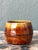 This vintage handcrafted studio pottery bowl is a compelling example of mid-century ceramic artistry, distinguished by its...