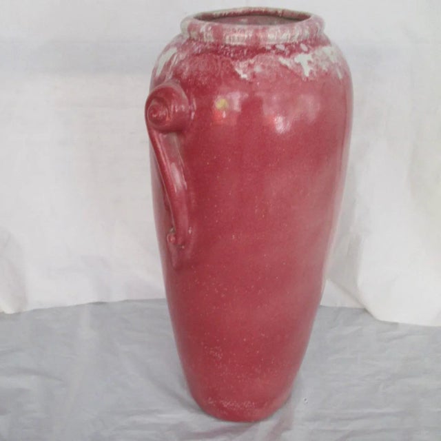 Tall heavy body American stoneware jar from the 30s-40s. Thick strong walls and bottom with decorative swirl design...