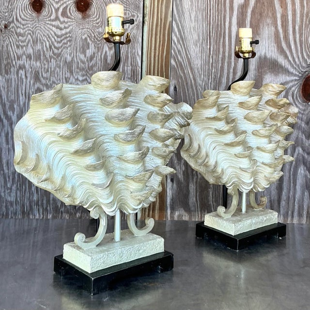 Capture the essence of seaside charm with these vintage coastal ruffle clamshell lamps. Featuring delicate ruffled edges...