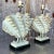Capture the essence of seaside charm with these vintage coastal ruffle clamshell lamps. Featuring delicate ruffled edges...
