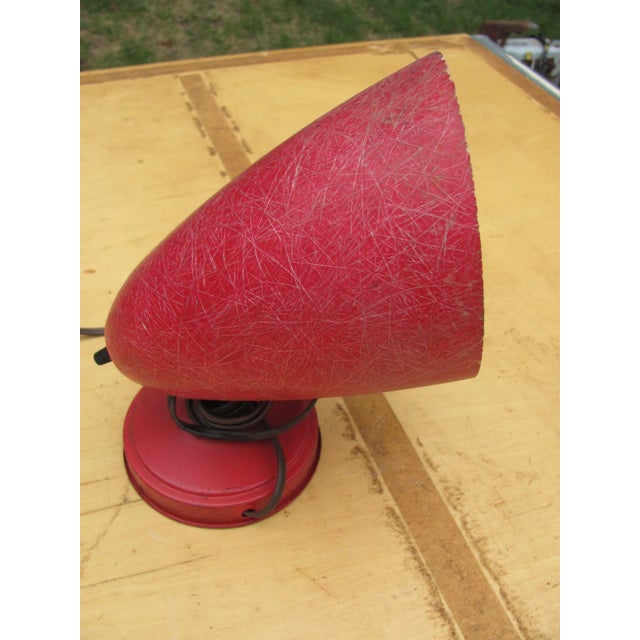 Really nice red fiberglass wall or desk lamp. Heavily fibered fiberglass shade and a formed metal base with a hanging...