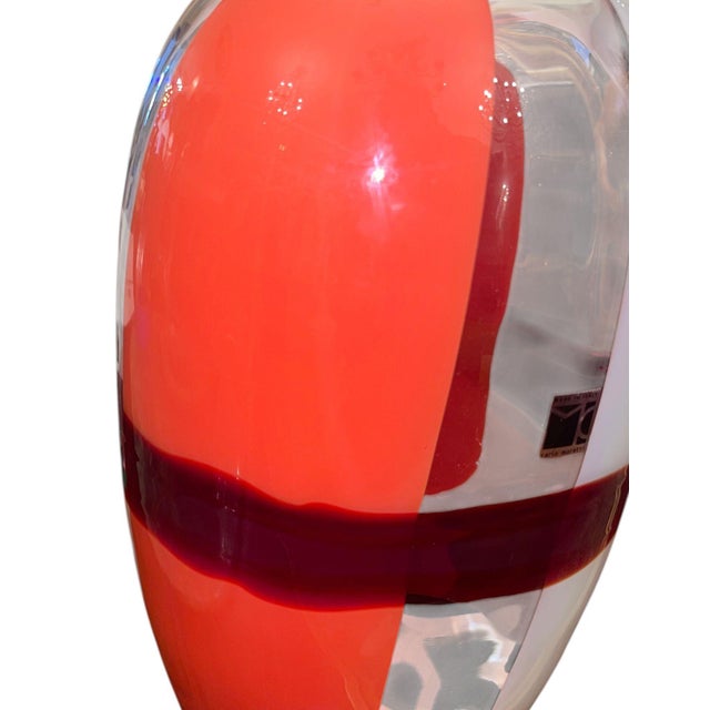 A striking vintage Murano glass vase by Carlo Moretti, Italy, Late 20th Century. The substantial hand-blown vessel...