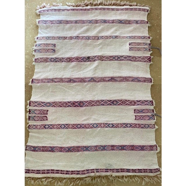 Highly unusual pink Moroccan wedding blanket. Stunning detail and next to new condition. Silver sequins and tassels make...