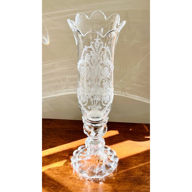 A signed Baccarat crystal Bambou patterned hurricane lamp, c.1920–1940. The candlestick base rises in a graceful baluster...